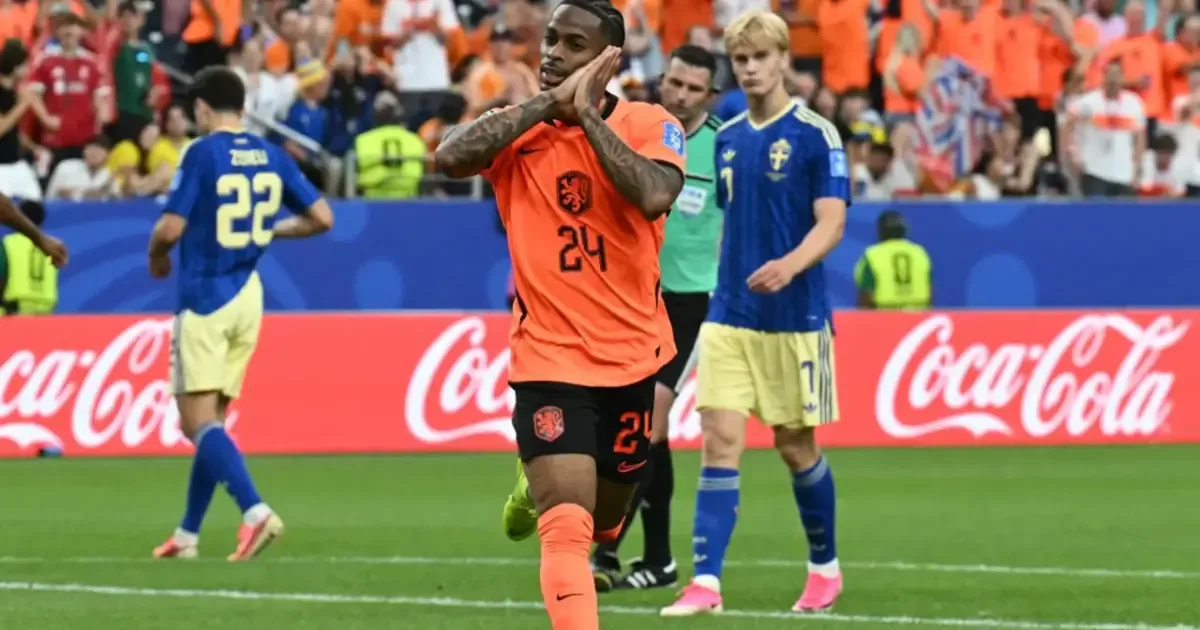 Netherlands players celebrate scoring a goal during their World Cup match against Sweden.