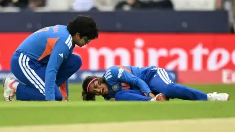 Shreyanka Patil in action during a cricket match, sidelined by injury for the Women's T20 World Cup 2026.