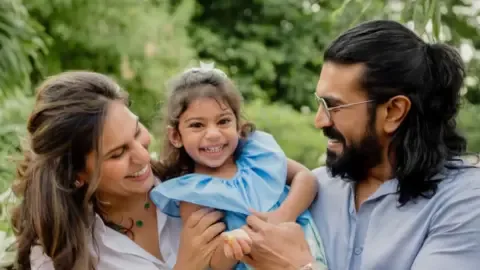 Ram Charan and Upasana with their daughter Klin Kaara on her 3rd birthday, revealing her face for the first time.