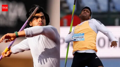 Neeraj Chopra in action, throwing a javelin with intense focus during a competition, showcasing his powerful technique.