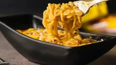 Nestle India denies Maggi infestation claim after viral video shows alleged insects in noodles.
