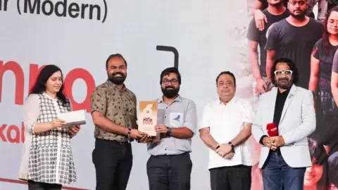 Sienna Kolkata restaurant interior with modern Indian decor and happy diners celebrating their win at the NDTV Food Awards 2026.