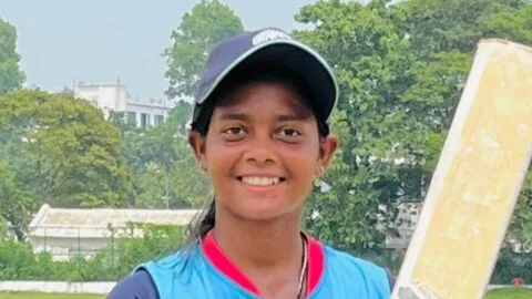Akshara Gupta celebrates her record-breaking innings of 306 runs off 126 balls.