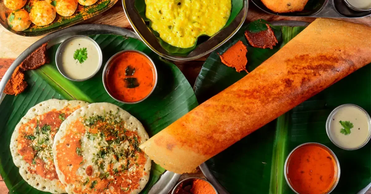 A vibrant street food stall in Bengaluru, India, showcasing a variety of delicious local dishes.
