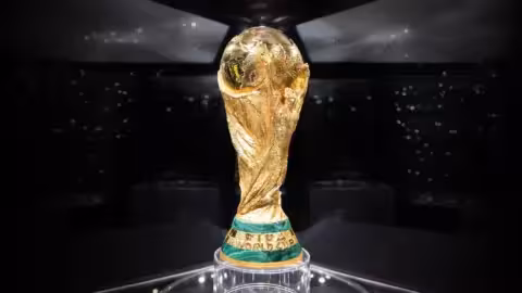 Close-up of the FIFA World Cup trophy, highlighting its gold
