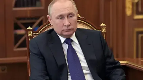 Russian flag with European Union flag in the background, symbolizing diplomatic talks.
