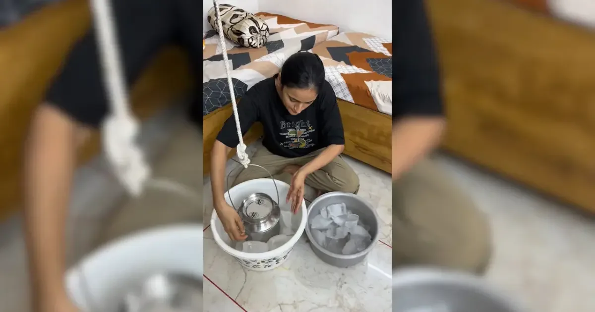 Gujarat woman creatively uses a ceiling fan to make ice cream, showcasing a clever 'desi jugaad' innovation.